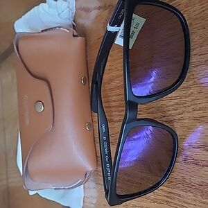 Bajio Calda sunglasses, black frames, violet glass lens
